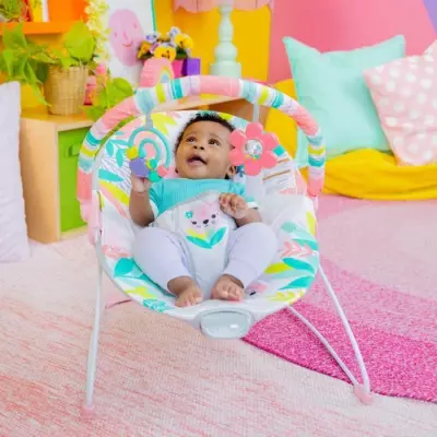 Transat BRIGHT STARTS Toucan avec Vibrations et Jouets - Dimensions: 34x9x51 cm