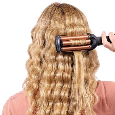 Lisseur BaByliss W2447E avec plaques larges ondulées
