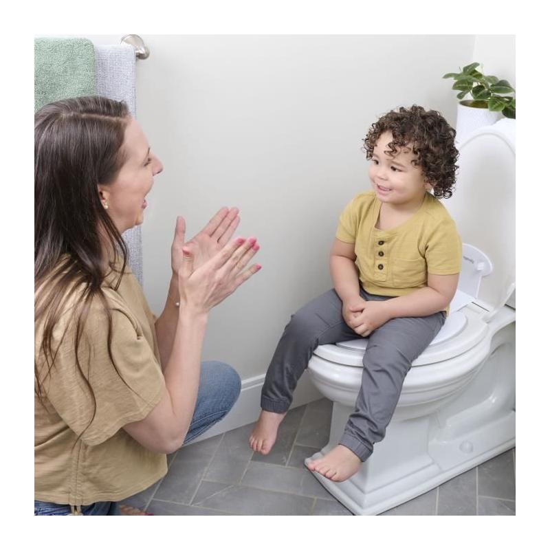 Réducteur de Toilette Ingenuity Flip & Sit - Fixation Adhésive