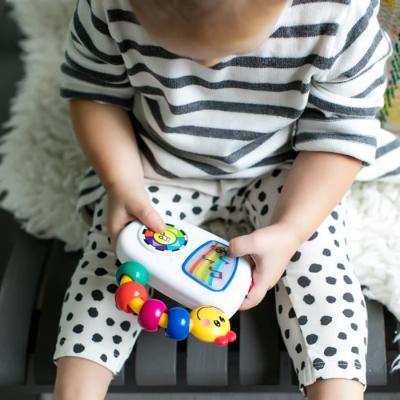 Hochet musical portable Take Along Tunes™ - Multi Coloris